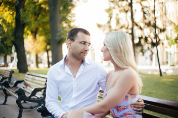 Beautiful couple in love dating outdoors and smiling