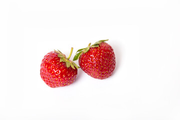 Two strawberries on a white background.