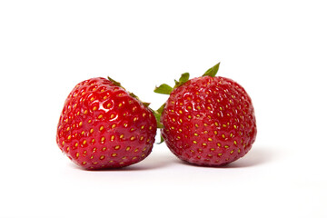 Two strawberries on a white background.
