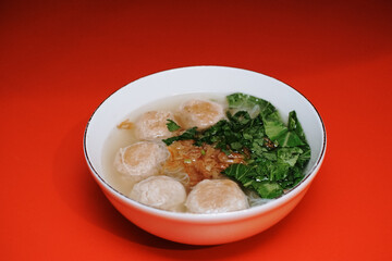 beef meatball soup with vermicelli and fried onions and fresh mustard leaves