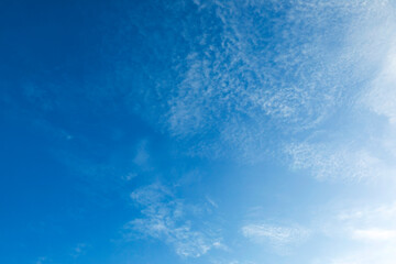 Fototapeta na wymiar Blue sky with smooth clouds