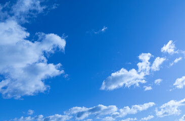 Naklejka na ściany i meble Blue sky with hard clouds