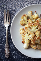 cauliflower in  at the wooden table