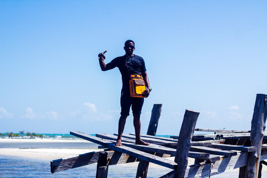 man standing on the pier