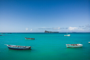 Fototapeta na wymiar Cap Malheureux with the island of Coin de Mire in the distance, Mauritius, Indian Ocean 