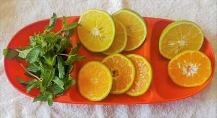 fresh citrus Melissa and oranges slice