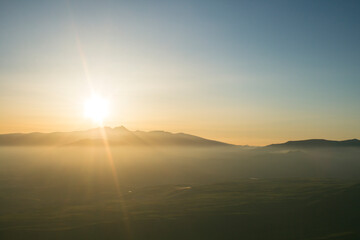 view from the top of Mount Hatis to sunset