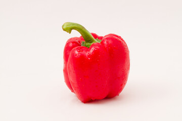 Red bell pepper isolated on a white background