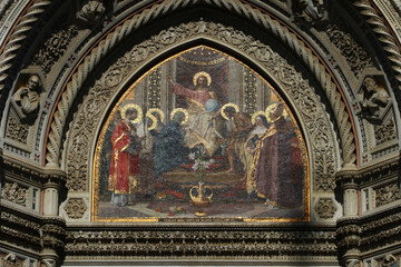 Santa Maria in Fiore Mosaic of the central portal lunette with golden details that reflect in the...