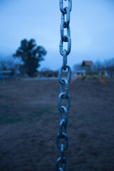 upright metal chain on a cloudy day