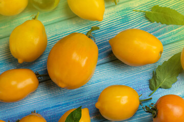Different sorts of tomatoes. Organic green, red, yellow, orange tomatoes