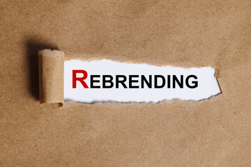 Torn paper with on a white background with a frame for text. Text rebrending