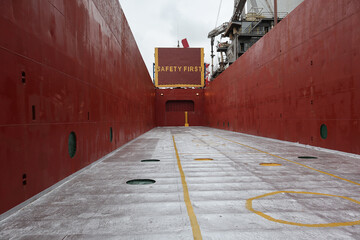 Inside empty cargo hold of general cargo ship
