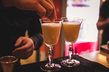 hand holding cocktail