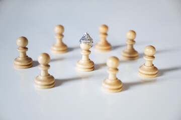 Conspiracy theory and manipulation concept in coronavirus time, group of pawn chess pieces are...