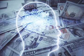 Double exposure of brain drawing over us dollars bill background. Technology concept.