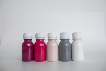 Set of colorful gouache paints on white background. Children's drawing