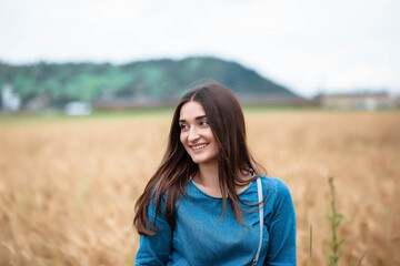 Portrait of a girl in a wheat field. Portrait of a beautiful girl in a wheat field.