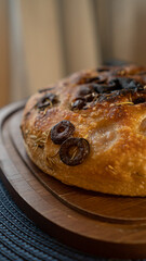 Rustic Italian Focaccia with black olives and rosemary. Traditional Focaccia