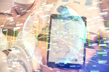 Double exposure of man's hands holding and using a phone and international business theme drawing.