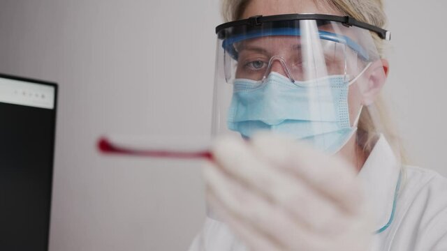 Covid 19 Coronavirus Scientists test for Covid-19 or Corona virus By using science tubes to research and treat illness in a laboratory or hospital. Medical treatment concepts