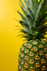 Pineapple and yellow background