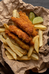 British fish and chips on dark background