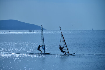 surfer group on the sea