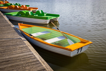 Green-orange boats and pedal boats