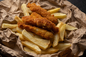 British fish and chips on dark background
