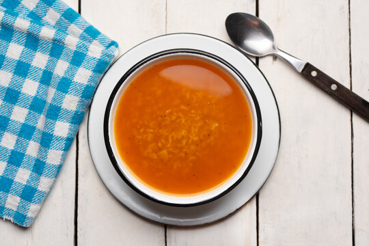 Alphabet soup pasta on white background