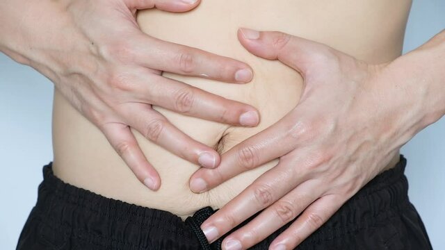 Men have stomach aches from enteritis or enteritis, health and medical concepts.