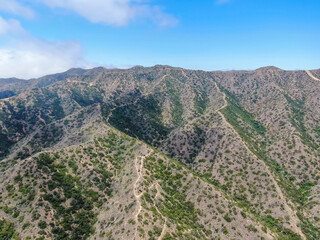 Aerial view Santa Catalina Island mountain peaks with blue sky. California, USA