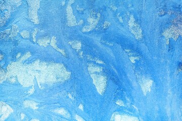 Frost pattern on the glass. Frost on the window. Winter photo. Cryesthesia. Freezing.