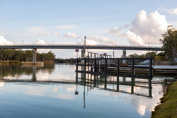The Berri bridge and water treatment plant with calm river murray located in the river land at...