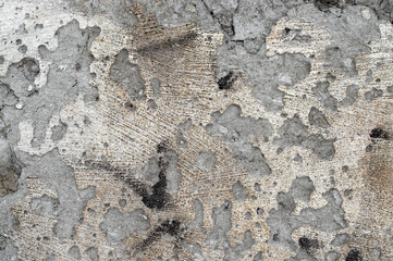 peeled peeling scratched stucco on concrete old wall surface for texture