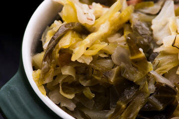 Stew of white cabbage and bacon. Vegetables, background