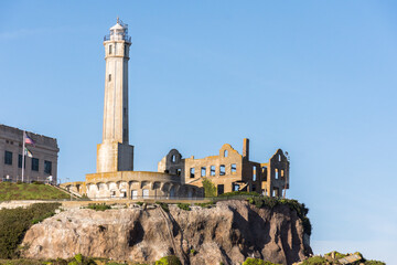 Fototapeta premium Alcatraz prison penitentiary lighthouse The Rock from the bay at sunset