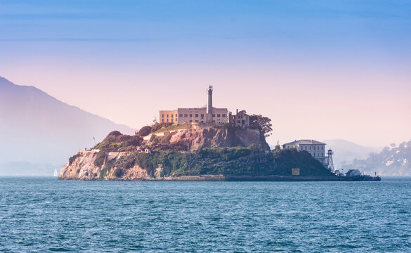 Alcatraz prison penitentiary The Rock from the bay at sunset