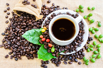 Cup of coffee and coffee beans