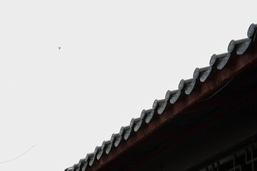 roof of a temple chinense tile roof wiht the sky