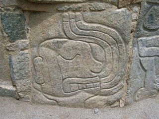 Relief representing severed head blooding at archaeological complex Sechin near Casma (central coast of Peru)