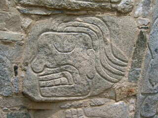 Relief representing severed head blooding at archaeological complex Sechin near Casma (central coast of Peru)