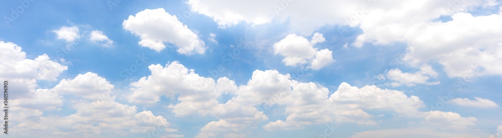 Wall mural panorama or panoramic photo of blue sky and white clouds or cloudscape. for breathing concepts backg