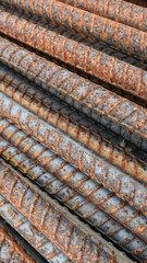 old rusty construction rebar background texture or wallpaper