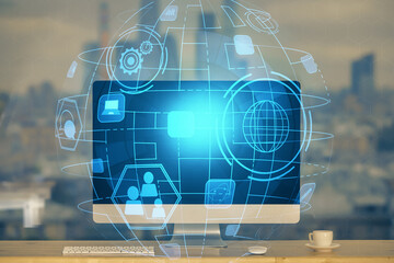 Computer on desktop with social network theme icon. Multi exposure. Concept of international connections.