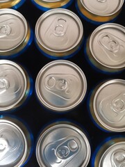 blue beer cans with lids top view
