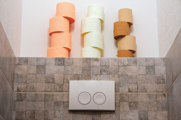 toilet button. Rolls of two colors