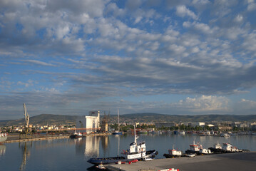 Fototapeta na wymiar 6/21/2020 Greece, Volos, commercial port east of the sun