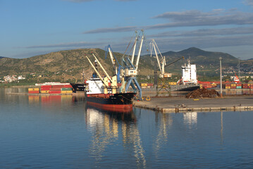 
6/21/2020 Greece, Volos, commercial port east of the sun